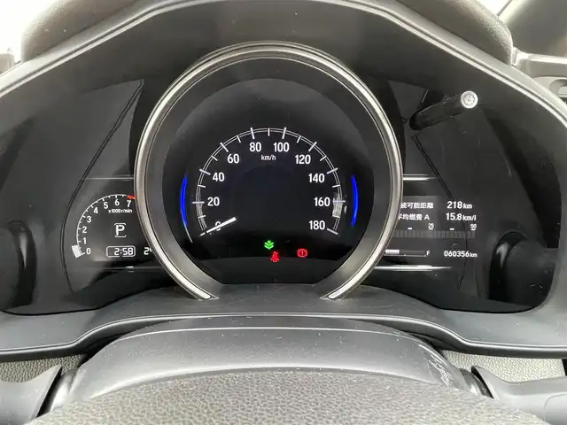 ホンダ フィット RS ホンダセンシング 山形県 2017(平29)年 6.1万km シャイニンググレーM ワンオーナ/衝突軽減ブレーキ/レーダークルーズコントロール/レーンキープアシスト/純正ディスプレイオーディオ（ワンセグ/CD/USB）/バックカメラ/社外前後ドライブレコーダー/革巻きステアリング/パドルシフト/ステアリングスイッチ/ビルトインETC/LEDヘッドライト/フォグランプ/ウィンカーミラー/アイドリングストップ/フロアマット/ドアバイザー/保証書/取扱説明書/社外AW付きスタッドレス積み込み（2016年製5分山）