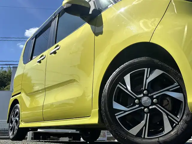 ダイハツ タント カスタム X 熊本県 2019(令1)年 5.8万km マスタードイエローマイカメタリック 純正9インチナビ（NSZN-Y69DS）/【フルセグTV/CD/DVD/Bluetooth】/バックカメラ/両側パワースライドドア/運転席ロングスライドシート/衝突軽減装置/コーナーセンサー/アイドリングストップ/純正15インチAW/前ドライブレコーダー/ビルトインETC/オートライト/電動格納ミラー/プッシュスタート/ステアリングスイッチ/フロアマット/ドアバイザー/横滑り防止/盗難防止装置/保証書/取扱説明書