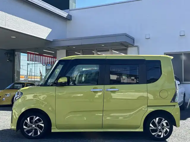 ダイハツ タント カスタム X 熊本県 2019(令1)年 5.8万km マスタードイエローマイカメタリック 純正9インチナビ（NSZN-Y69DS）/【フルセグTV/CD/DVD/Bluetooth】/バックカメラ/両側パワースライドドア/運転席ロングスライドシート/衝突軽減装置/コーナーセンサー/アイドリングストップ/純正15インチAW/前ドライブレコーダー/ビルトインETC/オートライト/電動格納ミラー/プッシュスタート/ステアリングスイッチ/フロアマット/ドアバイザー/横滑り防止/盗難防止装置/保証書/取扱説明書