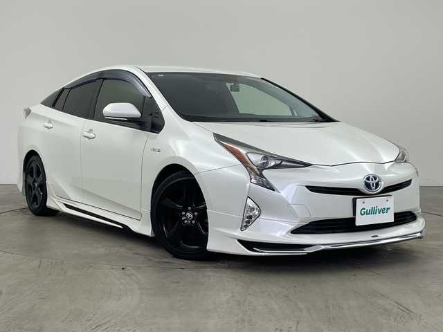 トヨタ プリウス S ツーリングセレクション 兵庫県 2016(平28)年 7.5万km ホワイトパールクリスタルシャイン ・社外9インチメモリナビ/・AM/FM/CD/DVD/HDMI/・Bluetooth接続/・フルセグTV/・ビルトインETC/・前後ドライブレコーダー/・モデリスタエアロ（F・S・R）/・前席シートヒーター/・革シート/・ステアリングスイッチ/・スマートキー/・LEDライト/・LEDフォグランプ/・プッシュスタート/・カーテンエアバック/・ローダウン/・純正フロアマット/・17インチ純正アルミホイール/・取扱説明書/・保証書/・スペアキー