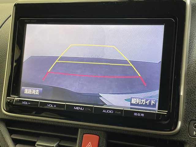 トヨタ エスクァイア ハイブリッド Gi 愛媛県 2015(平27)年 6.6万km ブラック 純正フリップダウンモニター/純正９型ナビ/フルセグTV　Bluetooth　DVD再生/バックカメラ/クルーズコントロール/両側電動スライドドア/レザーシート/クルーズコントロール/ドライブレコーダー/ＥＴＣ/おくだけ充電/シートヒーター/ＬＥＤ