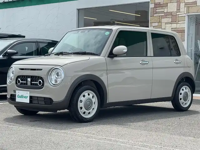 スズキ ラパン ＬＣ X 徳島県 2024(令6)年 0.5万km フォーンベージュM 純正ディスプレイオーディオ/ハーフレザーシート/シートヒーター/純正14インチアルミホイール/衝突被害軽減システム/レーンキープアシスト/横滑り防止装置/コーナーセンサー/バックカメラ/フロアマット/プッシュスタート/スマートキー
