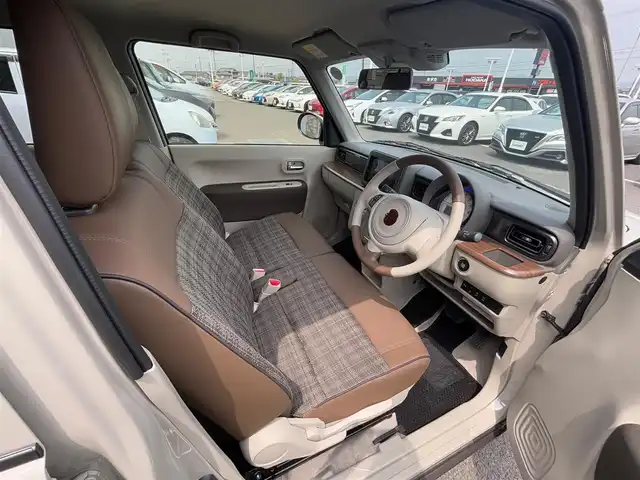 スズキ ラパン ＬＣ X 徳島県 2024(令6)年 0.5万km フォーンベージュM 純正ディスプレイオーディオ/ハーフレザーシート/シートヒーター/純正14インチアルミホイール/衝突被害軽減システム/レーンキープアシスト/横滑り防止装置/コーナーセンサー/バックカメラ/フロアマット/プッシュスタート/スマートキー
