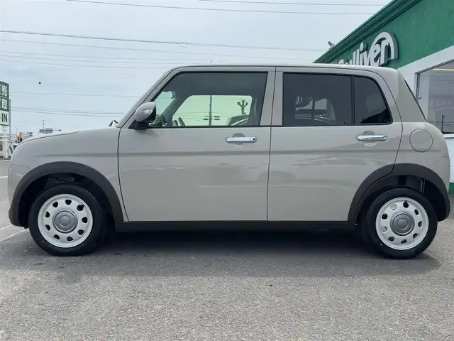 スズキ ラパン ＬＣ X 徳島県 2024(令6)年 0.5万km フォーンベージュM 純正ディスプレイオーディオ/ハーフレザーシート/シートヒーター/純正14インチアルミホイール/衝突被害軽減システム/レーンキープアシスト/横滑り防止装置/コーナーセンサー/バックカメラ/フロアマット/プッシュスタート/スマートキー