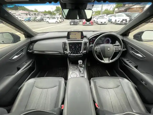 トヨタ クラウン ハイブリッド RS 愛媛県 2019(平31)年 2.7万km ブラック 純正ナビ　/全周囲カメラ　/自動駐車システム/トヨタセーフティセンス/レーダークルーズコントロール/衝突被害軽減装置/車線逸脱防止装置/ブラインドスポットモニター　/D/N席シートベンチレーション　/D/N席シートヒーター　/D/N席パワーシート　/ステアリングヒーター/ヘッドアップディスプレイ/パドルシフト　/ドラレコ　/電動パーキングブレーキ　/ETC2.0/電動チルト＆テレスコピック機構/現状サマー(純正AW)(225/45/R18)/BRIDGESTONE REGNO