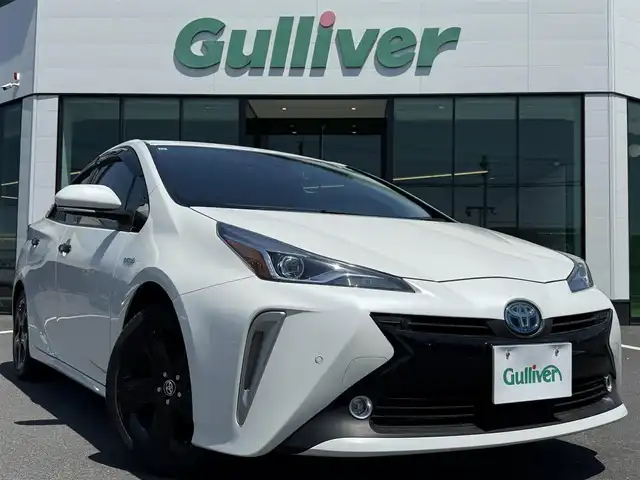 トヨタ プリウス Sツーリングセレクション 栃木県 2019(令1)年 3.4万km ホワイトパールクリスタルシャイン TRDサイドカバー/TRDドアバイザー/シックスセンスバンパーガーニッシュ/純正SDナビ/Bluetoothオーディオ/DVD再生機能/バックカメラ/フルセグTV（走行中視聴可）/ステアリングリモコン/トヨタセーフティセンス/プリクラッシュ/LDA/レーダークルーズコントロール/ブラックレザーシート /前席シートヒーター/ビルトインETC2.0/前後ドライブレコーダー/純正18インチAW/ブラックアクセントピース/スマートキー×2