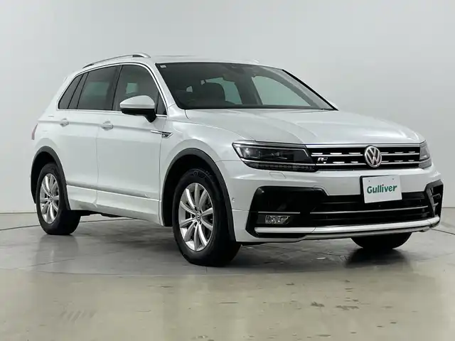 フォルクスワーゲン ティグアン TDI 4モーション Rライン 道央・札幌 2018(平30)年 9.3万km オリックスホワイトパールエフェクト ・4WD/ディーゼルターボ/サンルーフ/・オールインセーフティ/・9.2インチメーカー純正ナビ/・BT/CD/SD/USB(AppleCarPlay/AndroidAuto)/・360°ビューカメラ/・アダプティブクルーズコントロール/・パワーバックドア/・LEDオートライト/フォグランプ/・ヘッドアップディスプレイ/・レザーシート/シートヒーター/パワーシート/・アイドリングストップ/・スマートキー×2/・ETC2.0/・ドライブレコーダー前方/・純正AW付きサマータイヤ積込