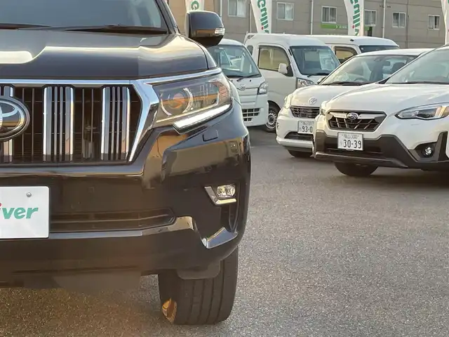 トヨタ ランドクルーザー プラド TX Lパッケージ 広島県 2021(令3)年 10.8万km ブラック ワンオーナー/純正メモリナビ/　【BT/Miracast/DTV】/パノラミックビューモニター/フロント/両サイド/バックカメラ/プリクラッシュセーフティー/レーダークルーズコントロール/ブラインドスポットモニター/先行車発進告知/ロードサインアシスト/クリアランスソナー/バックセンサー/レザーシート/シートヒーター/エアシート/パワーシート/ビルトインETC2.0/オートライト/純正LEDライト/フォグランプ/プッシュスタート/純正１９インチアルミホイール/純正ドアバイザー/リアプライバシーガラス/純正フロアマット/スペアキー【スマートキー】/ウインカーミラー/社外ドライブレコーダー(DC-DR412)/取扱説明書