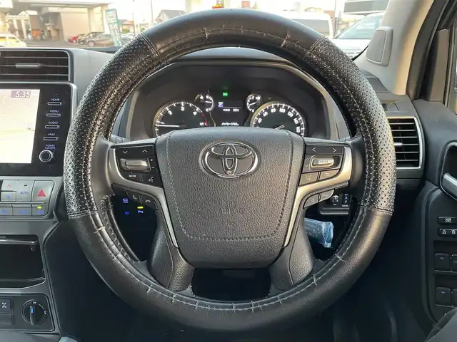 トヨタ ランドクルーザー プラド TX Lパッケージ 広島県 2021(令3)年 10.8万km ブラック ワンオーナー/純正メモリナビ/　【BT/Miracast/DTV】/パノラミックビューモニター/フロント/両サイド/バックカメラ/プリクラッシュセーフティー/レーダークルーズコントロール/ブラインドスポットモニター/先行車発進告知/ロードサインアシスト/クリアランスソナー/バックセンサー/レザーシート/シートヒーター/エアシート/パワーシート/ビルトインETC2.0/オートライト/純正LEDライト/フォグランプ/プッシュスタート/純正１９インチアルミホイール/純正ドアバイザー/リアプライバシーガラス/純正フロアマット/スペアキー【スマートキー】/ウインカーミラー/社外ドライブレコーダー(DC-DR412)/取扱説明書