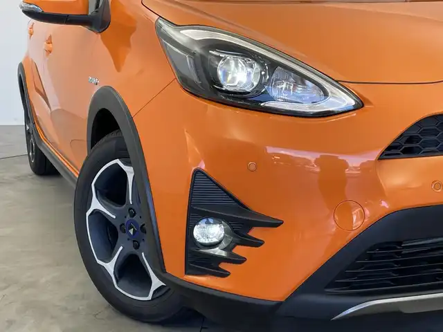 トヨタ アクア クロスオーバー 新潟県 2019(平31)年 1.5万km オレンジパールクリスタルシャイン 純正メモリナビ【NSZT-W68T】/　フルセグTV/Bluetooth/CD/DVD/トヨタセーフティセンス/・プリクラッシュセーフティ/・レーントレーシングアシスト/・レーンディパーチャーアラート/・レーダークルーズコントロール/・ロードサインアシスト/・オートマチックハイビーム/ハーフレザーシート/前席シートヒーター/前後コーナーセンサー/前後ドライブレコーダー/バックモニター/ビルトインETC/モデリスタアルミホイール/横滑り防止装置/LEDヘッドライト/オートマチックハイビーム/レザーステアリング/ステアリングスイッチ/禁煙車