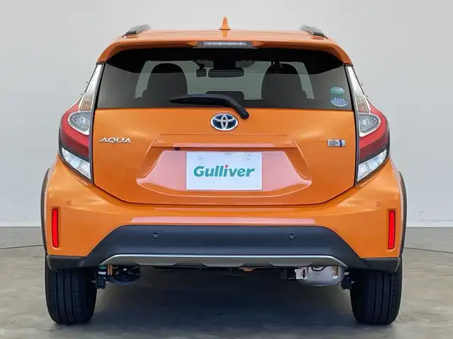 トヨタ アクア クロスオーバー 新潟県 2019(平31)年 1.5万km オレンジパールクリスタルシャイン 純正メモリナビ【NSZT-W68T】/　フルセグTV/Bluetooth/CD/DVD/トヨタセーフティセンス/・プリクラッシュセーフティ/・レーントレーシングアシスト/・レーンディパーチャーアラート/・レーダークルーズコントロール/・ロードサインアシスト/・オートマチックハイビーム/ハーフレザーシート/前席シートヒーター/前後コーナーセンサー/前後ドライブレコーダー/バックモニター/ビルトインETC/モデリスタアルミホイール/横滑り防止装置/LEDヘッドライト/オートマチックハイビーム/レザーステアリング/ステアリングスイッチ/禁煙車