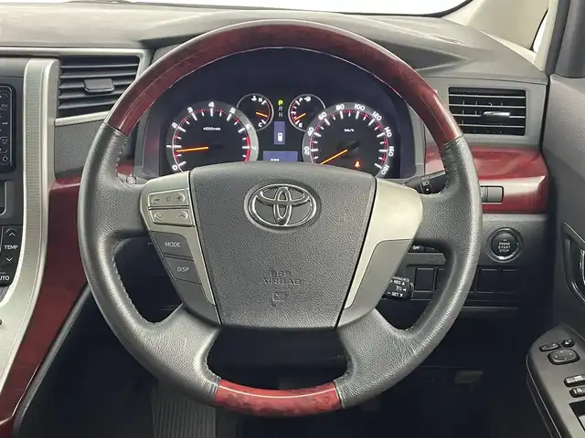 トヨタ ヴェルファイア 3．5Z 大分県 2009(平21)年 9.6万km ホワイトパールクリスタルシャイン 純正HDDナビ/（CD/DVD/Bluetooth）/バックカメラ/両側パワースライドドア/クルーズコントロール/ビルトインETC/クリアランスソナー/ウッドコンビステアリング/ステアリングスイッチ/スマートキープッシュスタート/純正アルミホイール/オートライト