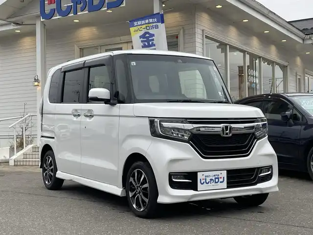 ホンダ Ｎ ＢＯＸ カスタム G L ホンダセンシング 秋田県 2019(令1)年 13.3万km プラチナホワイトパール (株)IDOMが運営する【じしゃロン秋田店】の自社ローン対象車両になります。こちらは現金ご利用時の価格です。自社ローンご希望の方は別途その旨お申付け下さい。/Honda SENSING/衝突軽減ブレーキ（CMBS）/誤発進抑制機能/後方誤発進抑制機能/近距離衝突軽減ブレーキ/歩行者事故低減ステアリング/路外逸脱抑制機能/アダプティブクルーズコントロール（ACC）/車線維持支援システム（LKAS）/先行車発進お知らせ機能/標識認識機能/オートハイビーム/パーキングセンサーシステム/純正SDナビ【CD/DVD/Bluetooth/Apple CarPlay/SD/USB/Music Rack/AUX/iPod】/バックカメラ/フルセグTV/ETC/両側パワースライドドア/前席シートヒーター