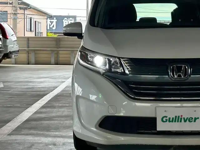 ホンダ フリード ハイブリット G ホンダセンシング 静岡県 2017(平29)年 3万km ホワイトオーキッドパール 純正SDナビ/・フルセグ/CD/DVD/Bluetooth/バックカメラ/ビルトインETC/両側パワースライドドア/クルーズコントロール追従有/ステアリングスイッチ/オートライト/スマートキー/・プッシュスタート/LEDヘッドライト/ウインカーミラー/純正フロアマット/ドアバイザー