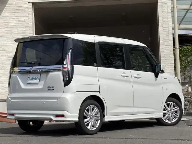 スズキ ソリオ HV MX 大分県 2024(令6)年 0.1万km ピュアホワイトP パワースライドドア /ディユアルカメラブレーキサポート/純正15インチアルミホイール/シートヒーター/スマートキー/保証書