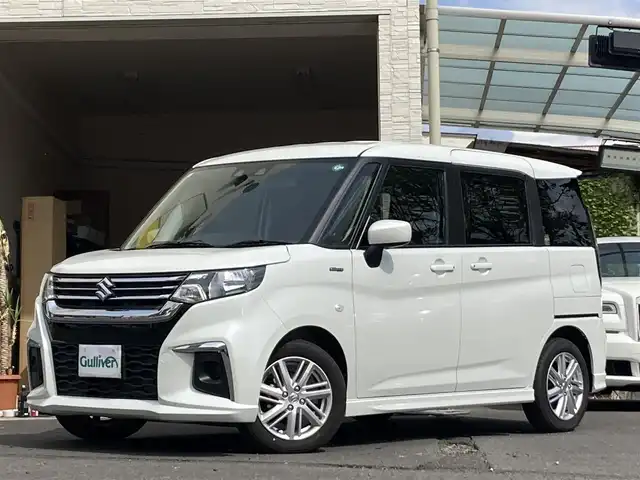 スズキ ソリオ HV MX 大分県 2024(令6)年 0.1万km ピュアホワイトP パワースライドドア /ディユアルカメラブレーキサポート/純正15インチアルミホイール/シートヒーター/スマートキー/保証書
