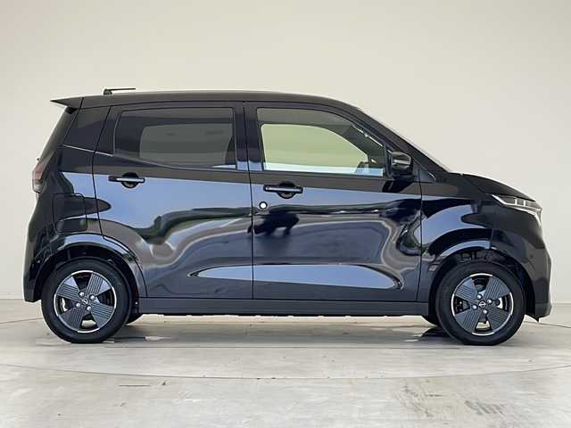 日産 サクラ X 愛知県 2024(令6)年 0.3万km 黒 衝突軽減システム/純正9型ナビ/フルセグ/CD DVD/Bluetooth/バックカメラ/コーナーセンサー/純正アルミホイール/LEDヘッドライト/オートマチックハイビーム/ETC/ステアリングスイッチ/スマートキー/プッシュスタート