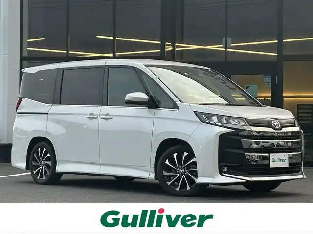 トヨタ ノア ハイブリッド S－Z 栃木県 2023(令5)年 3.4万km ホワイトパールクリスタルシャイン トヨタセーフティセンス/・プリクラッシュセーフティ/・レーンディパーチャーアラート/・レーントレーシングアシスト/・レーダークルーズコントロール/・オートマッチックハイビーム/・ロードサインアシスト/・ドライバー異常時対応システム/・プロアクティブドライビングアシスト/・発信遅れ告知機能/純正8インチディスプレイオーディオ/バックカメラ/ビルトインETC2.0/両側パワースライドドア/アクセサリーコンセント/クリアランスソナー/LEDヘッドライト/フォグランプ/ハーフレザーシート/シートヒーター/スマートキー