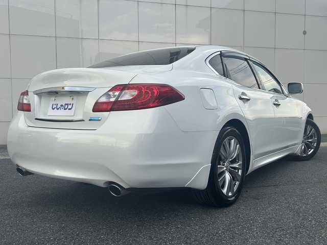 日産 フーガ ハイブリッド 埼玉県 2012(平24)年 7万km クリスタルホワイトパール (株)IDOMが運営する【じしゃロン熊谷店】の自社ローン専用車両になりますこちらは現金またはオートローンご利用時の価格です。自社ローンご希望の方は別途その旨お申付け下さい/純正ナビ/（ワンセグTV/Bluetooth/CD/DVD/AM/FM/）/ETC/バックカメラ/クルーズコントロール/オートライト/運転席ポジションメモリ/前席パワーシート/フォグランプ/HIDヘッドライト/ドアバイザー/純正AW/純正フロアマット/カーテンエアバッグ/車両・ナビ取扱説明書/保証書