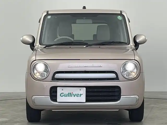 スズキ ラパン X 群馬県 2014(平26)年 7.4万km シャンパンピンクPM 禁煙車　純正ナビ　ＢＴ　ワンセグ　バックカメラ　アイドリングストップ　電動格納ミラー　オートライト　オートエアコン　ラパン専用コンビシート　ＨＩＤ　ナノイー　プッシュスタート　スマートキー　純正ＡＷ