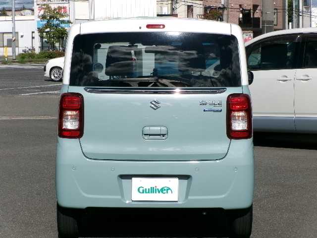スズキ ワゴンＲ スマイル HYBRID S 岡山県 2021(令3)年 2.9万km オフブルーメタリック/ホワイト2トーン 【SUZUKI Safety Support  】/・デュアルカメラブレーキサポート/・誤発進抑制機能/・車線逸脱警報機能/・ふらつき警報機能/・先行車発進お知らせ機能/・ハイビームアシスト/・標識認識機能/・後退時ブレーキサポート/・後方誤発進抑制機能/・リヤパーキングセンサー/・全方位モニター/純正メモリーナビ/フルセグテレビ/フロント・サイド・バックカメラ/DVD再生可能/Bluetooth/USB/スマートキー2個/運転席シートヒーター/両側パワースライドドア/社外フロアマット/社外ドライブレコーダー（フロント・リア）/リアソナー/オートライト
