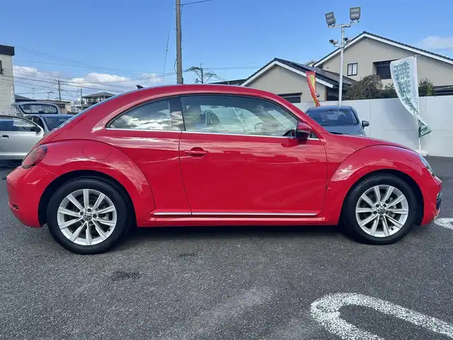 フォルクスワーゲン ザ・ビートル デザイン 大分県 2019(平31)年 8.1万km 赤 Volkswagen 純正ナビゲーションシステム/“716SDCW”【OP】/【Bluetooth/フルセグTV/DVD/CD/SD】/本革シート/前席シートヒーター/社外前後ドライブレコーダー/外部端子接続：USB/バックカメラ/スタティックコーナリングライト/ブラインドスポットディクション/ドライバー疲労検知システム/リアトラフィックアラート/ECS/ABS/ブレーキアシスト/バイセンキセノンヘッドライト【OP】/プッシュスタート/スマートキー2本/保証書/取扱説明書