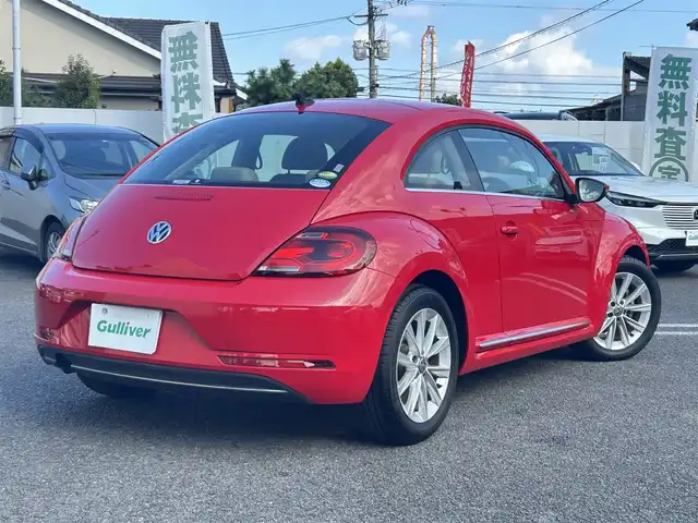 フォルクスワーゲン ザ・ビートル デザイン 大分県 2019(平31)年 8.1万km 赤 Volkswagen 純正ナビゲーションシステム/“716SDCW”【OP】/【Bluetooth/フルセグTV/DVD/CD/SD】/本革シート/前席シートヒーター/社外前後ドライブレコーダー/外部端子接続：USB/バックカメラ/スタティックコーナリングライト/ブラインドスポットディクション/ドライバー疲労検知システム/リアトラフィックアラート/ECS/ABS/ブレーキアシスト/バイセンキセノンヘッドライト【OP】/プッシュスタート/スマートキー2本/保証書/取扱説明書
