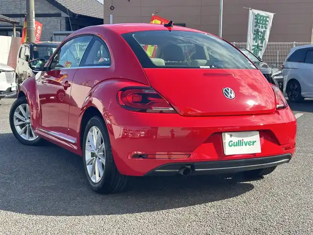 フォルクスワーゲン ザ・ビートル デザイン 大分県 2019(平31)年 8.1万km 赤 Volkswagen 純正ナビゲーションシステム/“716SDCW”【OP】/【Bluetooth/フルセグTV/DVD/CD/SD】/本革シート/前席シートヒーター/社外前後ドライブレコーダー/外部端子接続：USB/バックカメラ/スタティックコーナリングライト/ブラインドスポットディクション/ドライバー疲労検知システム/リアトラフィックアラート/ECS/ABS/ブレーキアシスト/バイセンキセノンヘッドライト【OP】/プッシュスタート/スマートキー2本/保証書/取扱説明書