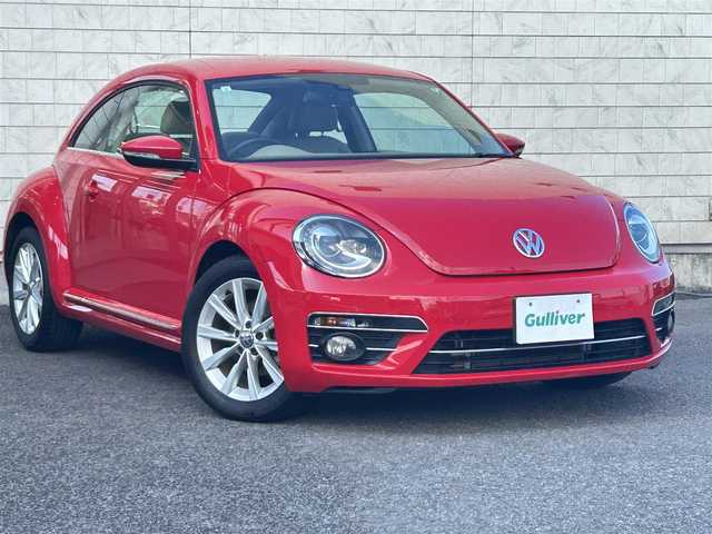 フォルクスワーゲン ザ・ビートル デザイン 大分県 2019(平31)年 8.1万km 赤 Volkswagen 純正ナビゲーションシステム/“716SDCW”【OP】/【Bluetooth/フルセグTV/DVD/CD/SD】/本革シート/前席シートヒーター/社外前後ドライブレコーダー/外部端子接続：USB/バックカメラ/スタティックコーナリングライト/ブラインドスポットディクション/ドライバー疲労検知システム/リアトラフィックアラート/ECS/ABS/ブレーキアシスト/バイセンキセノンヘッドライト【OP】/プッシュスタート/スマートキー2本/保証書/取扱説明書