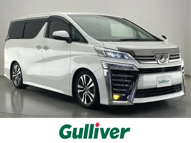 トヨタ ヴェルファイア Z Gエディション 愛知県 2018(平30)年 4.5万km ホワイトパールクリスタルシャイン アルパイン１１型ナビ　フルセグＴＶ　ＨＤＭＩ　アルパイン１２．８型後席モニター　ミラー型ドラレコ　前後ドラレコ　電動リアゲート　両側パワスラ　バックカメラ　黒革　シートヒーター　シートベンチレーション　オットマン　セーフティセンス　衝突軽減　追従クルコン　ＬＥDオートライト　フォグランプ　禁煙車