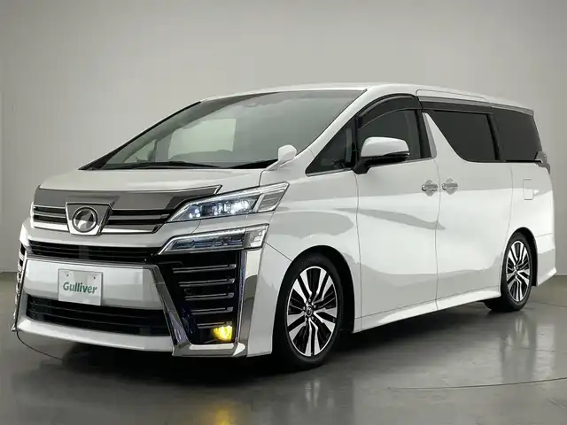 トヨタ ヴェルファイア Z Gエディション 愛知県 2018(平30)年 4.5万km ホワイトパールクリスタルシャイン アルパイン１１型ナビ　フルセグＴＶ　ＨＤＭＩ　アルパイン１２．８型後席モニター　ミラー型ドラレコ　前後ドラレコ　電動リアゲート　両側パワスラ　バックカメラ　黒革　シートヒーター　シートベンチレーション　オットマン　セーフティセンス　衝突軽減　追従クルコン　ＬＥDオートライト　フォグランプ　禁煙車