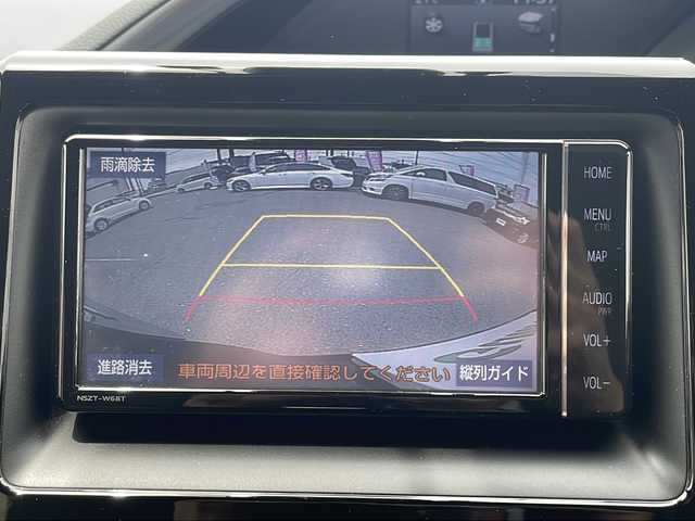 トヨタ エスクァイア ハイブリッド Gi プレミアムパッケージ 愛知県 2018(平30)年 4.8万km ブラッキッシュアゲハガラスフレーク /禁煙/ワンオーナー/ディーラー整備記録簿R2.3.4.5.6//純正ナビ/フルセグ/CD/DVD/SD/MSV/BT//バックカメラ/ビルトインETC/純正ドラレコ//前・後席用USB給電ソケット有//両側パワースライド/純正15インチAW//茶ハーフレザーシート/シートヒーター//コンビステア/ステアスイッチ/ステアヒーター//エアコンドリンクホルダー//リアロールサンシェード//純正LEDオートライト/オートハビーム//純正LEDフォグ//PCS/LDA/クルーズコントロール//純正フロアマット//純正ドアバイザー//新車時保証書//取扱説明書//ナビ取説//スペアスマートキー有