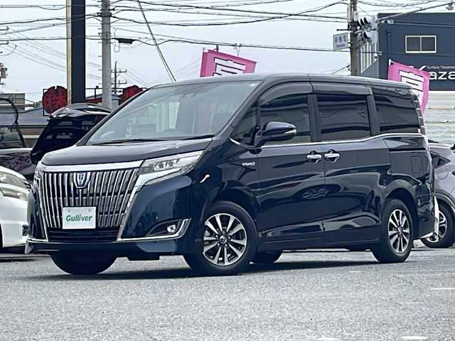 トヨタ エスクァイア ハイブリッド Gi プレミアムパッケージ 愛知県 2018(平30)年 4.8万km ブラッキッシュアゲハガラスフレーク /禁煙/ワンオーナー/ディーラー整備記録簿R2.3.4.5.6//純正ナビ/フルセグ/CD/DVD/SD/MSV/BT//バックカメラ/ビルトインETC/純正ドラレコ//前・後席用USB給電ソケット有//両側パワースライド/純正15インチAW//茶ハーフレザーシート/シートヒーター//コンビステア/ステアスイッチ/ステアヒーター//エアコンドリンクホルダー//リアロールサンシェード//純正LEDオートライト/オートハビーム//純正LEDフォグ//PCS/LDA/クルーズコントロール//純正フロアマット//純正ドアバイザー//新車時保証書//取扱説明書//ナビ取説//スペアスマートキー有
