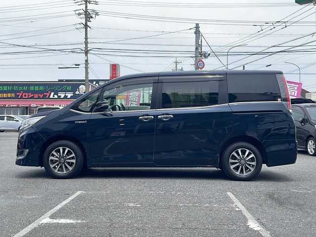 トヨタ エスクァイア ハイブリッド Gi プレミアムパッケージ 愛知県 2018(平30)年 4.8万km ブラッキッシュアゲハガラスフレーク /禁煙/ワンオーナー/ディーラー整備記録簿R2.3.4.5.6//純正ナビ/フルセグ/CD/DVD/SD/MSV/BT//バックカメラ/ビルトインETC/純正ドラレコ//前・後席用USB給電ソケット有//両側パワースライド/純正15インチAW//茶ハーフレザーシート/シートヒーター//コンビステア/ステアスイッチ/ステアヒーター//エアコンドリンクホルダー//リアロールサンシェード//純正LEDオートライト/オートハビーム//純正LEDフォグ//PCS/LDA/クルーズコントロール//純正フロアマット//純正ドアバイザー//新車時保証書//取扱説明書//ナビ取説//スペアスマートキー有