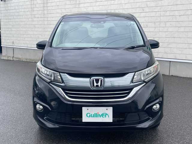 ホンダ フリード ハイブリット G ホンダセンシング 山形県 2017(平29)年 5.3万km クリスタルブラックパール 4WD/純正9インチSDナビ（VXM-185VFNi）/CD/DVD/BT/フルセグテレビ/SDミュージックサーバー/バックカメラ/ETC/ドライブレコーダー/衝突被害軽減ブレーキ/レーンキープアシスト/レーダークルーズコントロール/両側パワースライドドア/半革シート/シートヒーター/ステアリングスイッチ/スマートキー/プッシュスタート/LEDヘッドライト/オートライト/フォグランプ/純正15インチアルミホイール