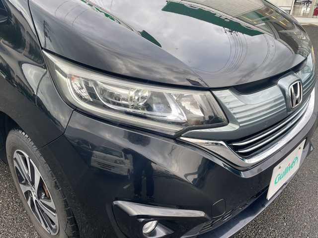 ホンダ フリード ハイブリット G ホンダセンシング 山形県 2017(平29)年 5.3万km クリスタルブラックパール 4WD/純正9インチSDナビ（VXM-185VFNi）/CD/DVD/BT/フルセグテレビ/SDミュージックサーバー/バックカメラ/ETC/ドライブレコーダー/衝突被害軽減ブレーキ/レーンキープアシスト/レーダークルーズコントロール/両側パワースライドドア/半革シート/シートヒーター/ステアリングスイッチ/スマートキー/プッシュスタート/LEDヘッドライト/オートライト/フォグランプ/純正15インチアルミホイール