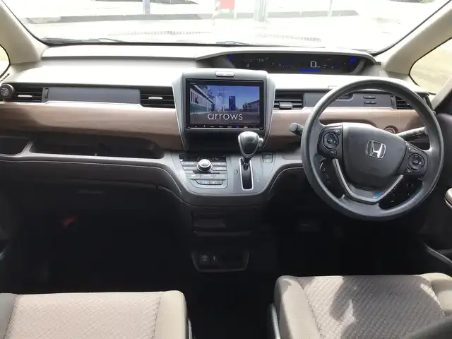 ホンダ フリード G ホンダセンシング 福井県 2020(令2)年 4.5万km クリスタルブラックパール 純正9型ナビ/純正フリップダウンモニター/両側電動ドア/LEDヘッドライト/ETC/バックカメラ/6人乗り/ホンダセンシング/クルーズコントロール/シートヒーター