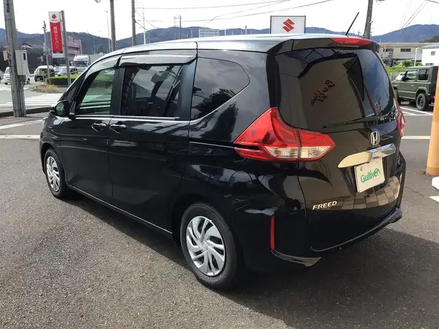 ホンダ フリード G ホンダセンシング 福井県 2020(令2)年 4.5万km クリスタルブラックパール 純正9型ナビ/純正フリップダウンモニター/両側電動ドア/LEDヘッドライト/ETC/バックカメラ/6人乗り/ホンダセンシング/クルーズコントロール/シートヒーター