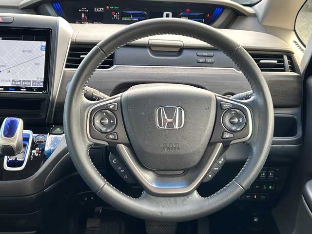 ホンダ フリード ハイブリット EX 石川県 2017(平29)年 6万km ホワイトオーキッドパール 純正SDナビ（DVD再生機能有）/ETC/ドライブレコーダー/Bluetooth/バックカメラ/フルセグTV/シートヒーター/ハーフレザーシート/衝突警報装置/レーンアシスト/両側パワースライドドア/LEDヘッドライト/レーダークルーズコントロール/スマートキー/純正15インチアルミ