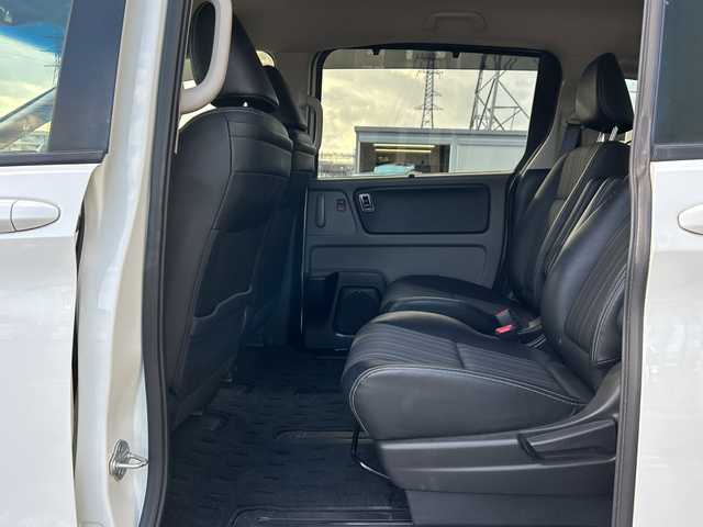 ホンダ フリード ハイブリット EX 石川県 2017(平29)年 6万km ホワイトオーキッドパール 純正SDナビ（DVD再生機能有）/ETC/ドライブレコーダー/Bluetooth/バックカメラ/フルセグTV/シートヒーター/ハーフレザーシート/衝突警報装置/レーンアシスト/両側パワースライドドア/LEDヘッドライト/レーダークルーズコントロール/スマートキー/純正15インチアルミ