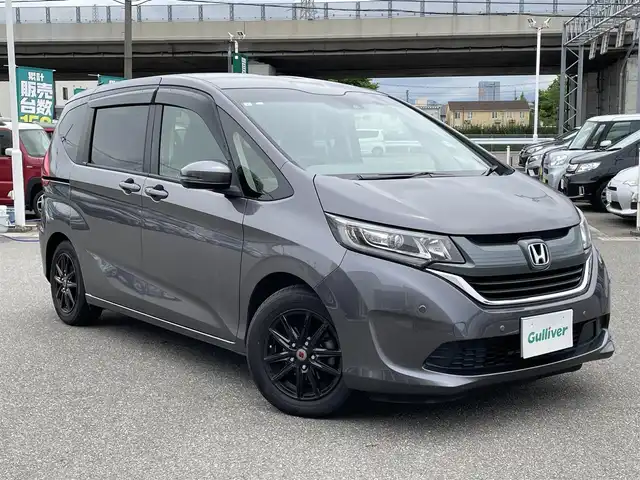 ホンダ フリード G ホンダセンシング 石川県 2019(平31)年 4.6万km グレー 純正9型メモリーナビ/純正CD/DVD/フルセグTV/バックカメラ/LEDヘッドライト/ホンダセンシング/レーダークルーズ/ETC/ドライブレコーダー/スマートキー/プッシュスタート/電動ミラー/両側パワースライドドア/社外アルミホイール/レーンキープアシスト/保証書