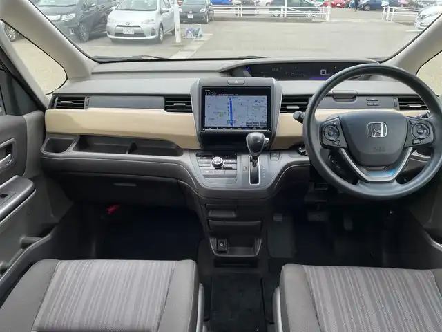 ホンダ フリード G ホンダセンシング 石川県 2019(平31)年 4.6万km グレー 純正9型メモリーナビ/純正CD/DVD/フルセグTV/バックカメラ/LEDヘッドライト/ホンダセンシング/レーダークルーズ/ETC/ドライブレコーダー/スマートキー/プッシュスタート/電動ミラー/両側パワースライドドア/社外アルミホイール/レーンキープアシスト/保証書