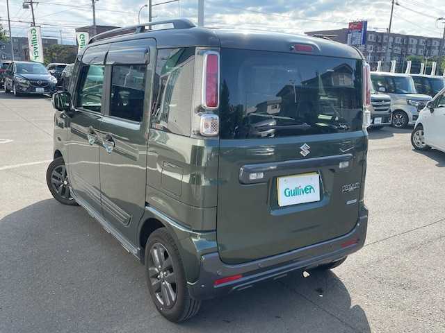 スズキ スペーシア ギア HYBRID XZターボ 道央・札幌 2023(令5)年 1.1万km クールカーキパールメタリック/ガンメタリック2トーン スズキセーフティサポート/・デュアルセンサーブレーキサポートII/・発進お知らせ機能/・標識認識機能/・HUD/・誤発進抑制機能/・後方誤発進抑制機能/・低速時ブレーキサポート（前進・後退）/・全方位モニター用カメラ/・ハイビームアシスト/・アダプティブクルーズコントロール/・車線維持支援機能/・車線逸脱抑制機能/・車線逸脱警報機能/ふらつき警報機能/ワンオーナー/純正HDDナビ/　CD DVD Bluetooth/フルセグテレビ/バックカメラ/アイドリングストップ/電格ウィンカーミラー/ドアバイザー/プッシュスタート/スマートキー/両側パワースライドドア/ビルトインETC/LEDヘッドライト/ルーフレール