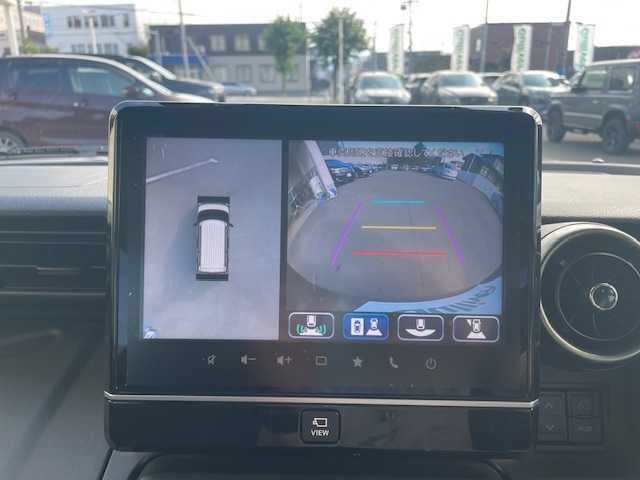 スズキ スペーシア ギア HYBRID XZターボ 道央・札幌 2023(令5)年 1.1万km クールカーキパールメタリック/ガンメタリック2トーン スズキセーフティサポート/・デュアルセンサーブレーキサポートII/・発進お知らせ機能/・標識認識機能/・HUD/・誤発進抑制機能/・後方誤発進抑制機能/・低速時ブレーキサポート（前進・後退）/・全方位モニター用カメラ/・ハイビームアシスト/・アダプティブクルーズコントロール/・車線維持支援機能/・車線逸脱抑制機能/・車線逸脱警報機能/ふらつき警報機能/ワンオーナー/純正HDDナビ/　CD DVD Bluetooth/フルセグテレビ/バックカメラ/アイドリングストップ/電格ウィンカーミラー/ドアバイザー/プッシュスタート/スマートキー/両側パワースライドドア/ビルトインETC/LEDヘッドライト/ルーフレール