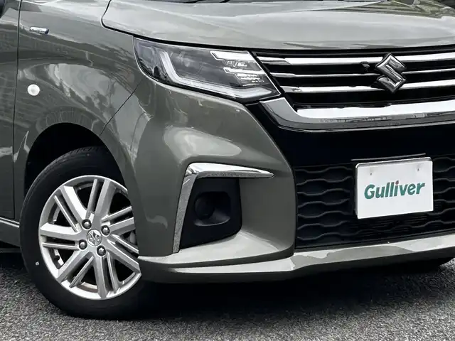 スズキ ソリオ HV MX 静岡県 2024(令6)年 0.7万km タフカーキパールメタリック ユーザー買取車両/ワンオーナー/純正ナビ/　【CD/DVD/BT/地デジフルセグTV】/純正LEDヘッドライト/純正15インチAW/衝突被害軽減システム/車線逸脱警報/レーダークルーズコントロール/全方位カメラ/ビルトインETC/前席シートヒーター/ドライブレコーダー/片側パワースライドドア/USBポート/新車時保証書/取扱説明書/スペアキー×1