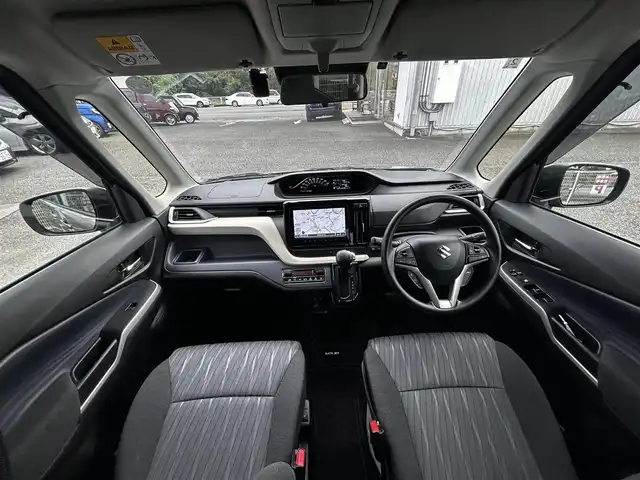 スズキ ソリオ HV MX 静岡県 2024(令6)年 0.7万km タフカーキパールメタリック ユーザー買取車両/ワンオーナー/純正ナビ/　【CD/DVD/BT/地デジフルセグTV】/純正LEDヘッドライト/純正15インチAW/衝突被害軽減システム/車線逸脱警報/レーダークルーズコントロール/全方位カメラ/ビルトインETC/前席シートヒーター/ドライブレコーダー/片側パワースライドドア/USBポート/新車時保証書/取扱説明書/スペアキー×1