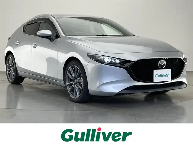 マツダ マツダ３ファストバック XD Lパッケージ 愛知県 2022(令4)年 2.8万km ソニックシルバーM 純正８．８型ナビ　ＢＯＳＥ　黒革　全方位カメラ　禁煙車　ＨＵＤ　フルセグＴＶ　ＤＶＤ　追従クルコン　衝突軽減　ＬＥＤオートライト　ＨＤＭＩ　シートヒーター　ステアリングヒーター　前後ドラレコ　ＥＴＣ　パドルシフト　プッシュスタート　スマートキー　メモリ付きパワーシート　BSM　