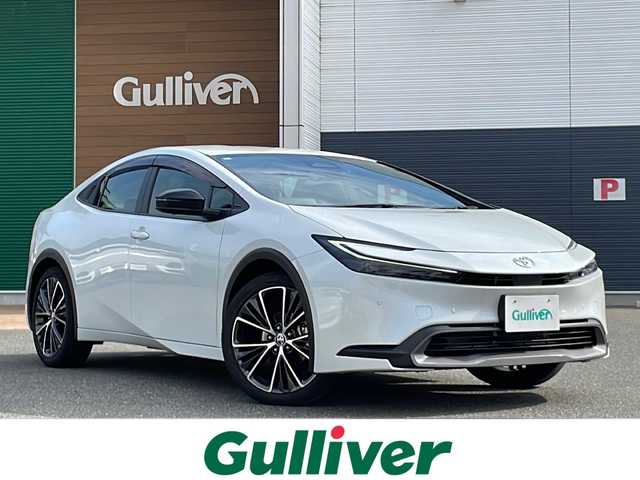 トヨタ プリウス G 佐賀県 2024(令6)年 0.7万km プラチナホワイトパールマイカ 純正ディスプレイオーディオ/Bluetooth/USB/フルセグTV/アラウンドビューモニター/ワンオーナー/追尾機能付きクルーズコントロール/レーンキープアシスト/オートマチックハイビーム/プリクラッシュセーフティ/ブラインドスポットモニター/リアカメラディクション/ロードサインアシスト/ブレーキホールド/LEDオートライト/オートエアコン/全席シートヒーター/前後ドライブレコーダー/電格ウィンカーミラー/ステアリングスイッチ/保証書/取扱説明書/記録簿/ETC/スペアキー有