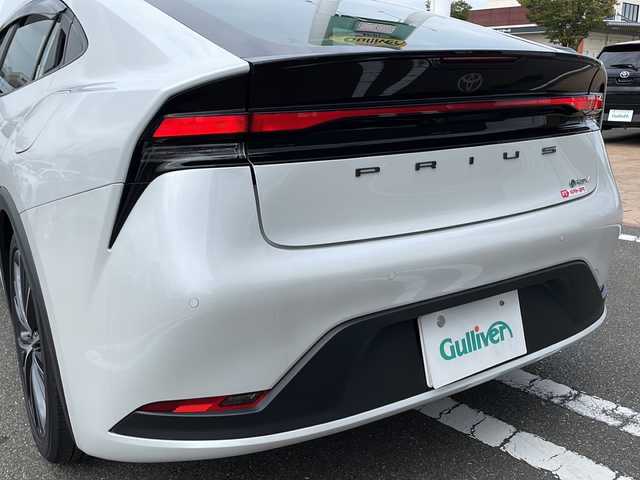 トヨタ プリウス G 佐賀県 2024(令6)年 0.7万km プラチナホワイトパールマイカ 純正ディスプレイオーディオ/Bluetooth/USB/フルセグTV/アラウンドビューモニター/ワンオーナー/追尾機能付きクルーズコントロール/レーンキープアシスト/オートマチックハイビーム/プリクラッシュセーフティ/ブラインドスポットモニター/リアカメラディクション/ロードサインアシスト/ブレーキホールド/LEDオートライト/オートエアコン/全席シートヒーター/前後ドライブレコーダー/電格ウィンカーミラー/ステアリングスイッチ/保証書/取扱説明書/記録簿/ETC/スペアキー有