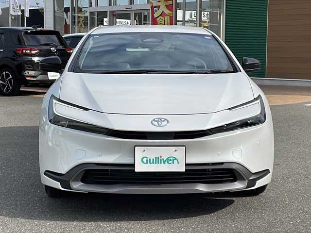 トヨタ プリウス G 佐賀県 2024(令6)年 0.7万km プラチナホワイトパールマイカ 純正ディスプレイオーディオ/Bluetooth/USB/フルセグTV/アラウンドビューモニター/ワンオーナー/追尾機能付きクルーズコントロール/レーンキープアシスト/オートマチックハイビーム/プリクラッシュセーフティ/ブラインドスポットモニター/リアカメラディクション/ロードサインアシスト/ブレーキホールド/LEDオートライト/オートエアコン/全席シートヒーター/前後ドライブレコーダー/電格ウィンカーミラー/ステアリングスイッチ/保証書/取扱説明書/記録簿/ETC/スペアキー有